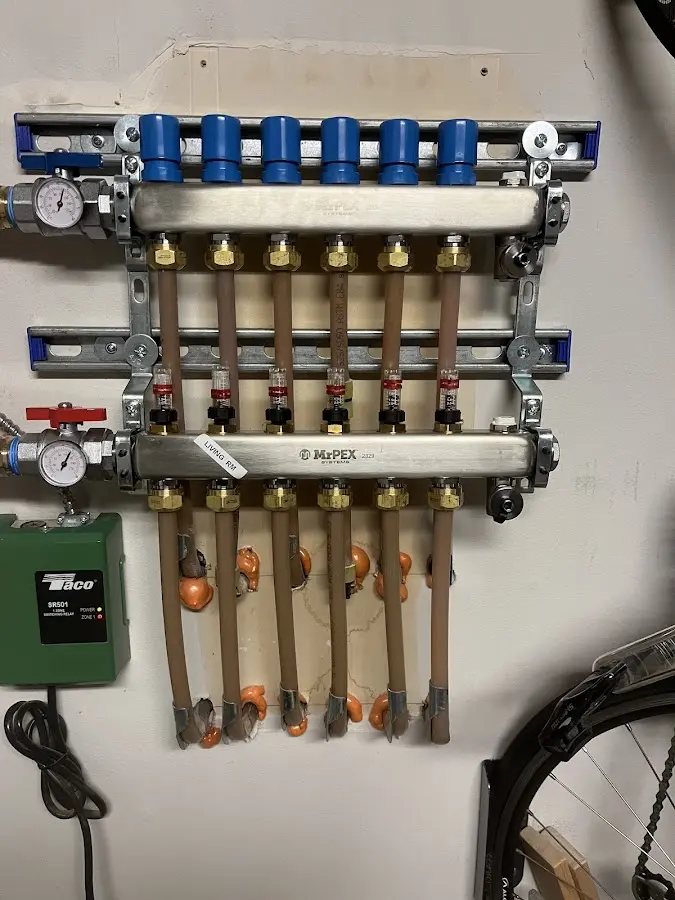 Plumber performing Gas Line Installation at a residential property in Grain Valley